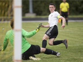 Essex Red Raiders captain Jackson Moore watches one of his two goals head into the net during Wednesday's SWOSSAA boy's AA soccer final, which Essex won 4-0 to advance to OFSAA.