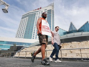 Striking Caesars Windsor employees are shown on the picket line on Thursday, May 17, 2018. They vote on a deal to end the strike on Friday.