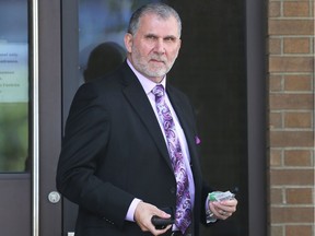Real estate agent Robert Tatomir leaves the Superior Court of Justice in Windsor on Wednesday, May 23, 2018.