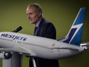 WestJet president and CEO Ed Sims addresses the airline's annual meeting in Calgary on May 8, 2018.