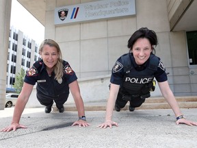Firefighter Donna Desantis, left, and Constable Yvonne Ouimet, shown June 8, 2018, are taking part in the Women on Fire event aimed at getting more women interested in jobs in the emergency services field.