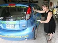Tania Dohring charges her MiEV, full electric car June 21, 2018. Dohring has a 3Kw solar power unit on her garage which supplies enough electricity for her car to run all year.