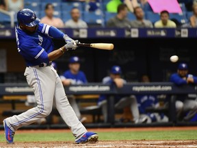 Teoscar Hernandez #37 of the Toronto Blue Jays hits a single in the fifth inning against the Tampa Bay Rays on June 13, 2018, at Tropicana Field in St Petersburg, Fla. The Rays won 1-0.