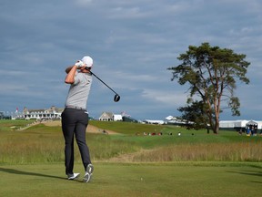 Justin Rose of England plays his shot from the ninth tee during the second round of the 2018 U.S. Open at Shinnecock Hills Golf Club on June 15, 2018, in Southampton, New York.