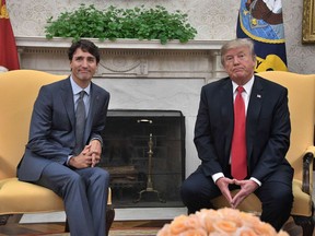 Steep new tariffs imposed on Canadian steel and aluminum exports to the USA has sparked a trade war. In this Oct. 11, 2017, file photo, US President Donald Trump and Canadian Prime Minister Justin Trudeau look on during their meeting at the White House in Washington, DC.