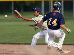 In this July 28, 2015, file photo, Riverside's Joey Bellacicco fields the throw to second but Chris Hewlett of the Walker Homesites makes it in safely at Walker Homesite Park. The Walker Homesites Athletic Club will be celebrating its 60th anniversary at the park on Monday.