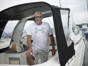 Randy Booth is pictured on his boat at Riverside Marina on June 16, 2018.