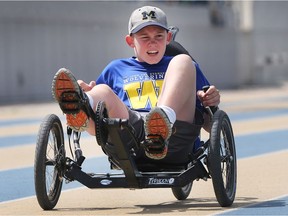 Brody Daigneau, a grade 8 student from St. John the Evangelist Catholic Elementary School competes in the 1500 metre race during an elementary track and field meet on Wednesday, June 6, 2018 at the University of Windsor. Despite of his physical disabilities Brody completed the race in his specialized three-wheeled bike.