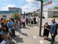 Marina Clemens was honoured for her decades of work in Ford City on Thursday, June 28, 2018. Drouillard Road will now also be known as Marina Clemens Way. A ceremony was held at Drouillard and Richmond Street in front of Drouillard Place, where she worked for almost 40 years. Clemens poses with Mayor Drew Dilkens after the unveiling of the new sign.