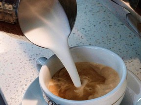 In this Sept. 22, 2017, file photo, a barista pours steamed milk into a cup of coffee at a cafe in Los Angeles. State health officials proposed a regulation change on June 15, 2018, that would declare coffee doesn't present a significant cancer risk, countering a recent California state court ruling that had shaken up some coffee drinkers.