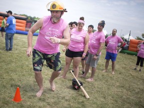 Keith Ellis, from Valiant Power Train, competes in seventh annual Windsor Corporate Challenge at the Vollmer Complex, Saturday, June 16, 2018.