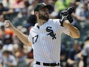Chicago White Sox starting pitcher Lucas Giolito throws against the Detroit Tigers during the first inning of a baseball game in Chicago, Saturday, June 16, 2018.