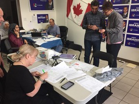 At Adam Ibrahim’s campaign headquarters volunteers work the phones to get out the PC vote in Windsor West on June 7, 2018.