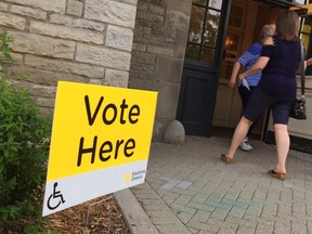 Voters cast their ballots.