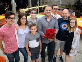 The Summerlin family —  Ricky, left, Rosanna, Cole, Rob, Connor, Andy, Mia, and Luca, front, —  pose at the Bash for Brandon fundraiser at Shakers Lounge in Kingsville on June 3, 2018. Rob's son, Brandon, 21, had a double-lung transplant in April.