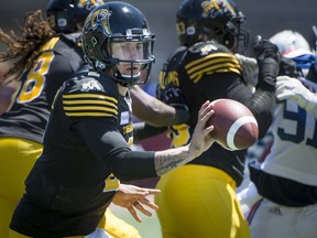 Hamilton Tiger-Cats quarterback Johnny Manziel tosses the ball against the Montreal Alouettes on June 9.