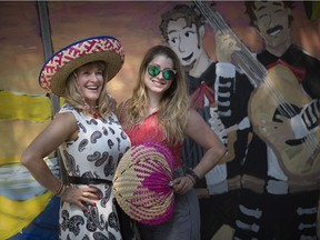 Adelina Trottier, left, and Andrea Bechard pose for a photo at the 2018 Fiesta Latina on Pelissier Street and Maiden Lane, Saturday, June 30, 2018.
