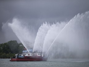The Curtis Randolph, a fireboat with the Detroit Fire Department, pumps water from the Detroit River at the annual Blessing of the Fleet at the Windsor Yacht Club on June 3, 2018.