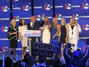 Ontario's Premier Doug Ford with his family on stage after addressing his supporters at the Toronto Congress Centre   on Thursday June 7, 2018. Jack Boland/Toronto Sun/Postmedia Network