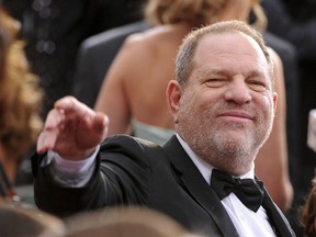 In this Feb. 22, 2015, file photo, Harvey Weinstein arrives at the Oscars. The New York Times and The New Yorker magazine have now won an award for revealing sexual harassment and rape allegations against him going back decades.