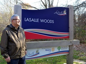 Larry Silani, director of development and strategic initiatives for the Town of LaSalle, looks over the LaSalle Woods conservation area off Normandy Road in this file photo.