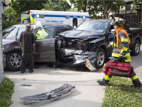 EMS Paramedics and Windsor Fire and Rescue respond to a two-car-collision at the corner of Cataraqui Street and Chilver Road, adjacent to King Edward Public School on Thursday, June 7, 2018.