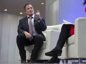 Quicken Loans founder Dan Gilbert is interviewed by Bloomberg News anchor Betty Liu at the North American International Auto Show at Cobo Hall on Jan. 8, 2017.