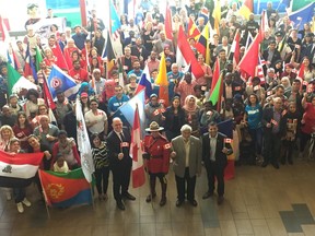 A crowd gathers Wednesday, June 27, 2018, at Windsor's aquatic complex to celebrate Canadian Multiculturalism Day. Mayor Drew Dilkens, RCMP Const. Mark Gagnier, Essex County Warden Tom Bain, and Windsor coun. Fred Francis stand at the front.