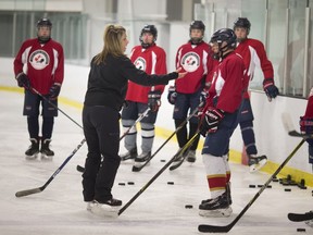 WINDSOR, ONT:. JUNE 7, 2018 -- Marianne Watkins, an NHL skating consultant, works with kids from the Brennan Hockey Academy at Central Park Athletics, Thursday, June 7, 2018.