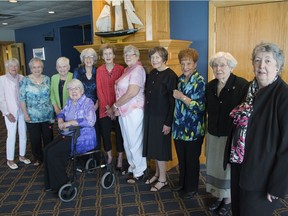 Ann Clark, left, Marion Murray, Dorothy Davidson, Ruth Trenholme, Jean Horne, Bev Simpson, Mary Burbridge, Anna Stankov, Jean Carter, Jane McGeachy, and (sitting) Jean Echlin, sitting, gathered at the Windsor Yacht Club on June 9, 2018, for the 65th reunion of the Grace Hospital 1953 graduating class of nurses.