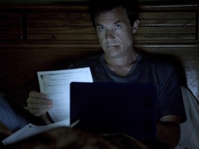 This image released by Netflix shows Jason Bateman in a scene from the series, "Ozark." The sophomore season of series premieres on Aug. 31.