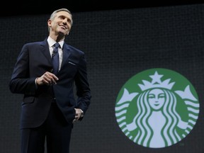 In this March 18, 2015, file photo, Starbucks CEO Howard Schultz speaks at the coffee company's annual shareholders meeting in Seattle.