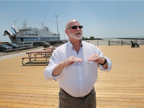 Leamington Mayor John Paterson is shown Thursday on the Leamington Dock, which is being transformed into a pedestrian pier with fencing, observation deck, tables, chairs and more to come.