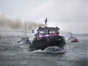 The International Tug Boat Race takes place in the Detroit River, Saturday, June 23, 2018.  The race started under the Ambassador Bridge and ended at Dieppe Park in downtown Windsor.