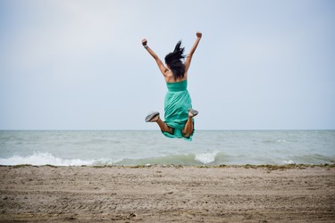 Summer is time for jumping and playing and enjoying the beach and water.