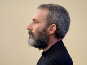 Former Holy See diplomat Monsignor Carlo Alberto Capella attends his trial inside a courtroom, at the Vatican, Saturday, June 23, 2018.