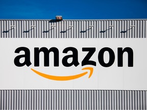 Amazon is pushing to incorporate traditional retailers' tools into its business model and will print a holiday toy catalog.