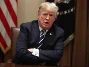 U.S. President Donald Trump talks about his meeting with Russian President Vladimir Putin, during a meeting with House Republicans in the Cabinet Room of the White House on July 17, 2018 in Washington, DC. Following a diplomatic summit in Helsinki, Trump faced harsh criticism after a press conference with Putin where he would not say whether he believed Russia meddled with the 2016 presidential election.