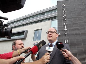 Windsor Mayor Drew Dilkens announces his candidacy for the position of mayor outside City Hall on July 24, 2018.