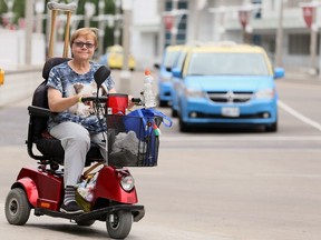 Sharon Weber, a post-polio patient who uses a mobility scooter, was disappointed she could not get an accessible taxi from Windsor's train station to Caesars Windsor on Sunday night.