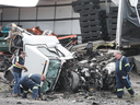 The wreckage of a collision between two tractor-trailers is shown on Friday, June 22, 2018 on Highway 401 near Tilbury. One driver was killed and the other hurt. Postmedia)
