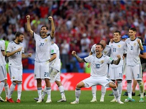 Russia players celebrate during the penalty shoot out following the 2018 FIFA World Cup Russia Round of 16 match between Spain and Russia at Luzhniki Stadium on July 1, 2018 in Moscow, Russia.