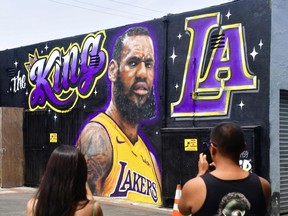 A mural of LeBron James in a Los Angeles Lakers jersey in Venice, California, on July 9, 2018. Artists Jonas Never and Menso One painted the mural to welcome outside the Baby Blues BBQ resturant in Venice to welcome LeBron James to Los Angeles.