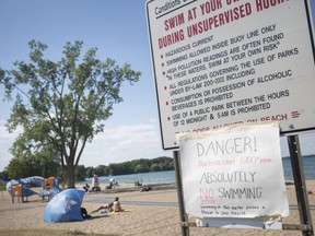 'Danger!' A sign on July 18, 2018, warns of high pollution levels in the water at Sand Point Beach. Windsor's only outdoor beach is closed to swimmers.