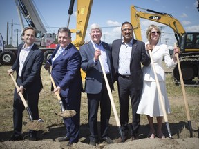 Shovels finally hit the dirt on Gordie Howe International Bridge project. At a formal groundbreaking in Detroit neighbourhood of Delray on July 17, 2018, were Michigan Lt. Gov. Brian Cauley, left, Windsor-Detroit Bridge Authority chairman Dwight Duncan, Michigan Gov. Rick Snyder, Canada's Minister of Infrastructure and Communities Amarjeet Sohi and U.S. Ambassador to Canada Kelly Craft.