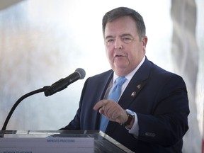 Dwight Duncan, Chair, Windsor-Detroit Bridge Authority, speaks during the groundbreaking for advance construction on the Gordie Howe International Bridge in the Delray neighbourhood of Detroit, Tuesday, July 17, 2018. Duncan is leaving the post.