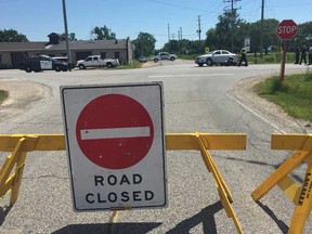 Barriers placed by Amherstburg police at County Road 8 and Broderick Road after a fatal motorcycle collision on July 9, 2018.