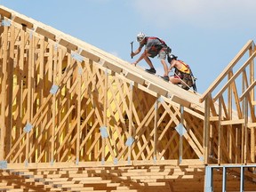 'No stopping us.' A sewage expansion project is expected to spur new development in Amherstburg. In this Aus. 1, 2017, file photo, workers are shown at a multi-level commercial development on Dalhousie Street.