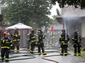 Windsor firefighters are shown on the scene of a house fire on Sunday, July 22, 2018, in the 3100 block of Elmwood Crescent in Windsor, ON. The fire broke out at approximately 3:00 p.m. and caused significant damage to the home. Residents were able to get out of the home without incident.