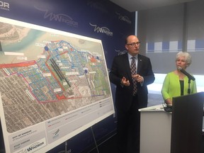Mayor Drew Dilkens and Coun. Jo-Anne Gignac, at city hall Monday, July 23, 2018, announce an $89.3-million, 10-year plan to address basement flooding in east Windsor.
